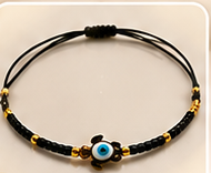 Bracelet cordon tortue œil turquoise porte-bonheur, couleur noir