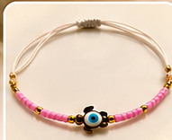 Bracelet cordon tortue œil turquoise porte-bonheur, couleur rose