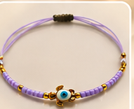 Bracelet cordon tortue œil turquoise porte-bonheur, couleur violet